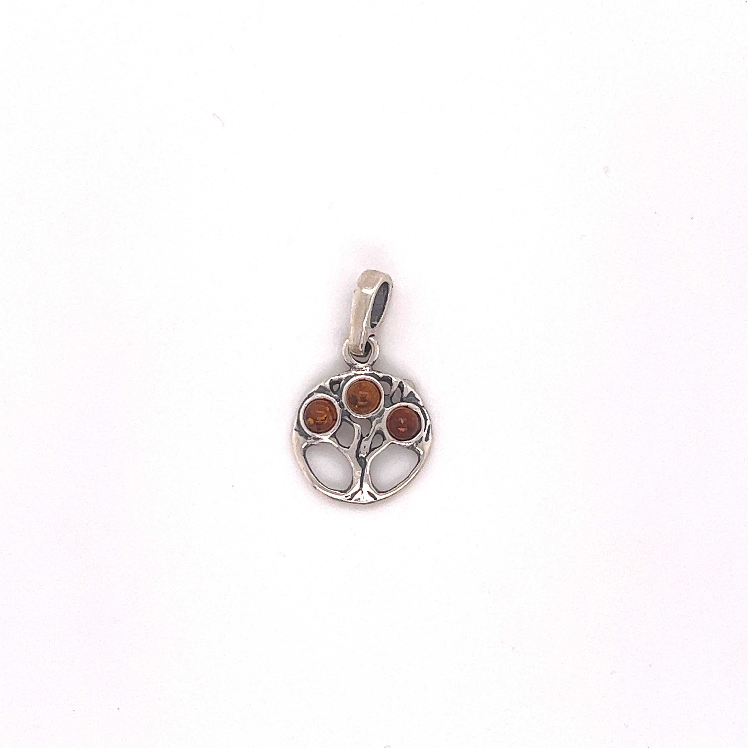 A Super Silver Dainty Amber Tree of Life Pendant with brown stones.