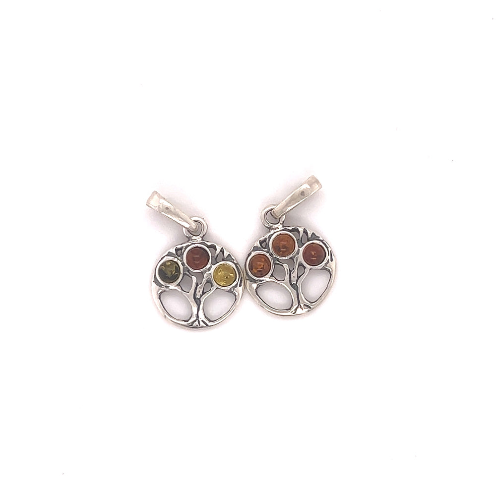 Two Super Silver Dainty Amber Tree of Life charms on a white background, featuring Baltic amber pendants.