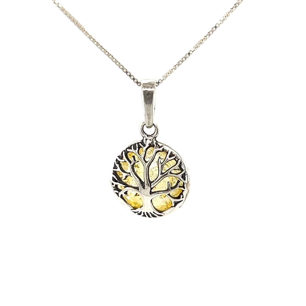 A Charming Tree Of Life Lemon Amber pendant by Super Silver on a silver chain.