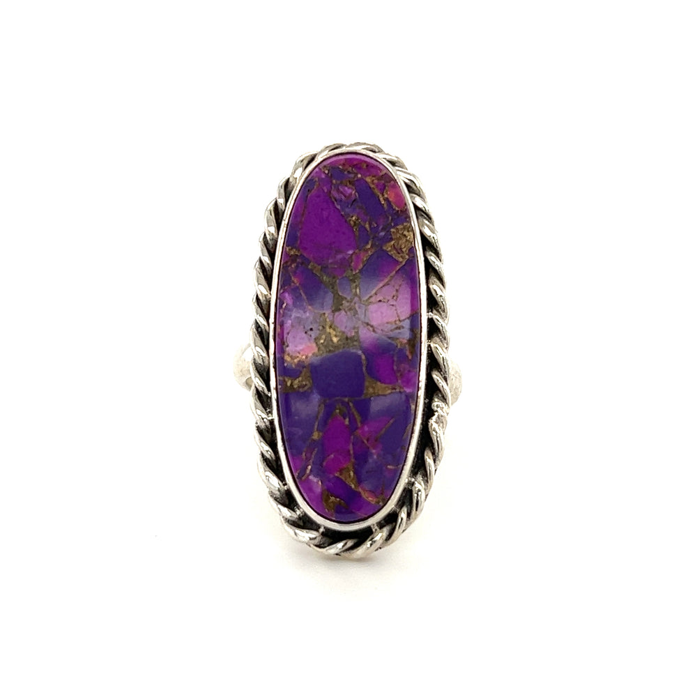 
                  
                    A striking Exquisite Long Purple Turquoise Ring, making a bold statement on a white background, by Super Silver.
                  
                