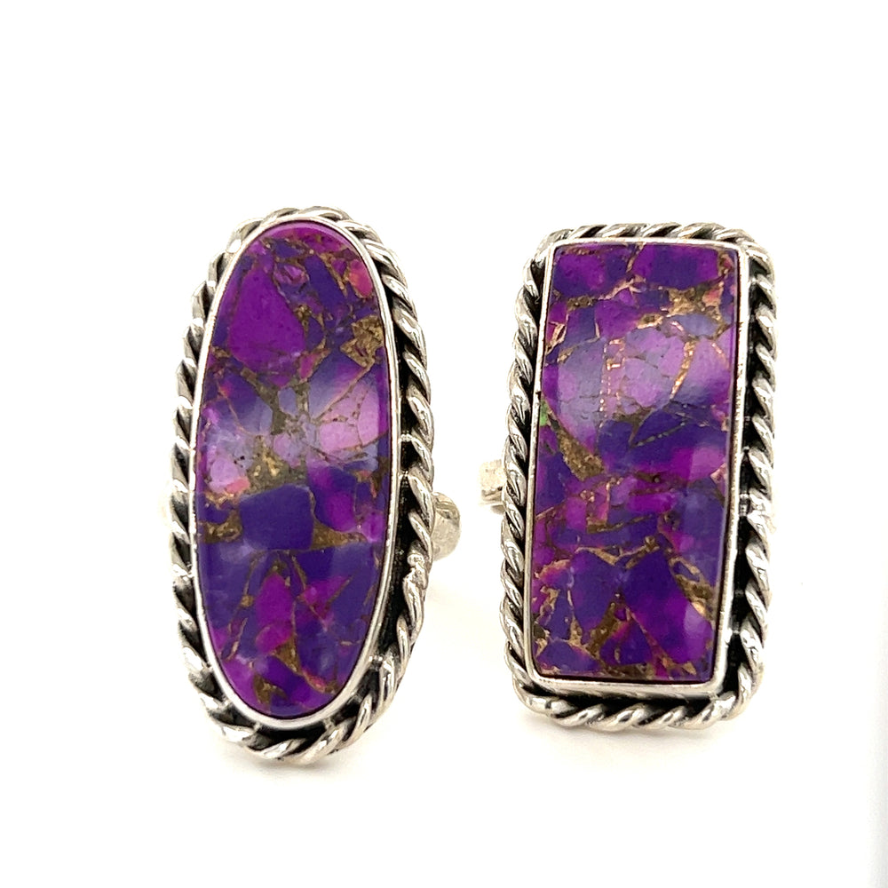 A striking pair of Super Silver Exquisite Long Purple Turquoise Rings with bold statement piece qualities.