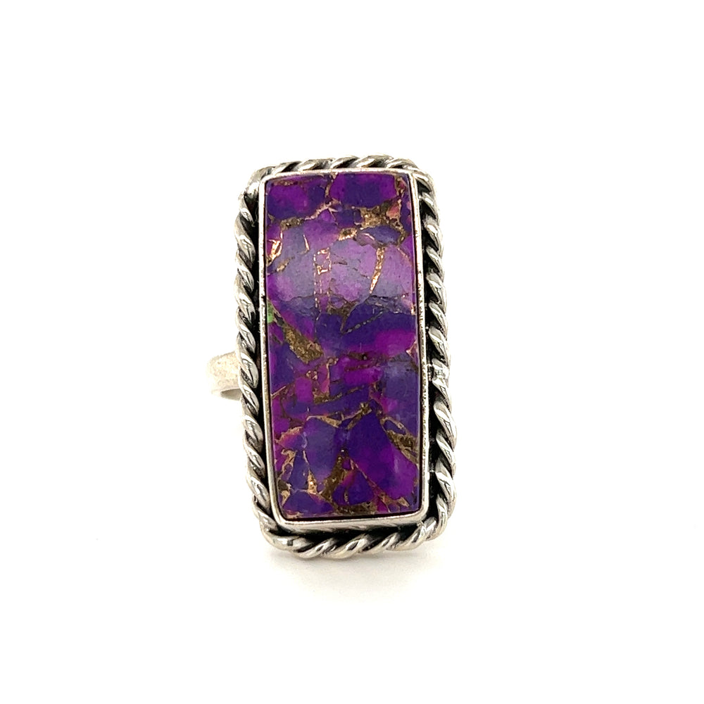 
                  
                    A striking Exquisite Long Purple Turquoise Ring with a Super Silver frame.
                  
                