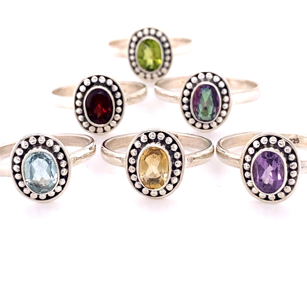 A set of Oval Gemstone Rings with Ball Disk Border, perfect for those with a boho style in Santa Cruz.