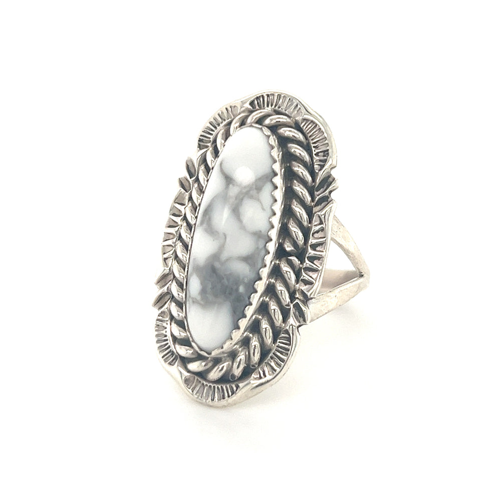 A native-inspired striking white buffalo turquoise ring with a white marble stone.