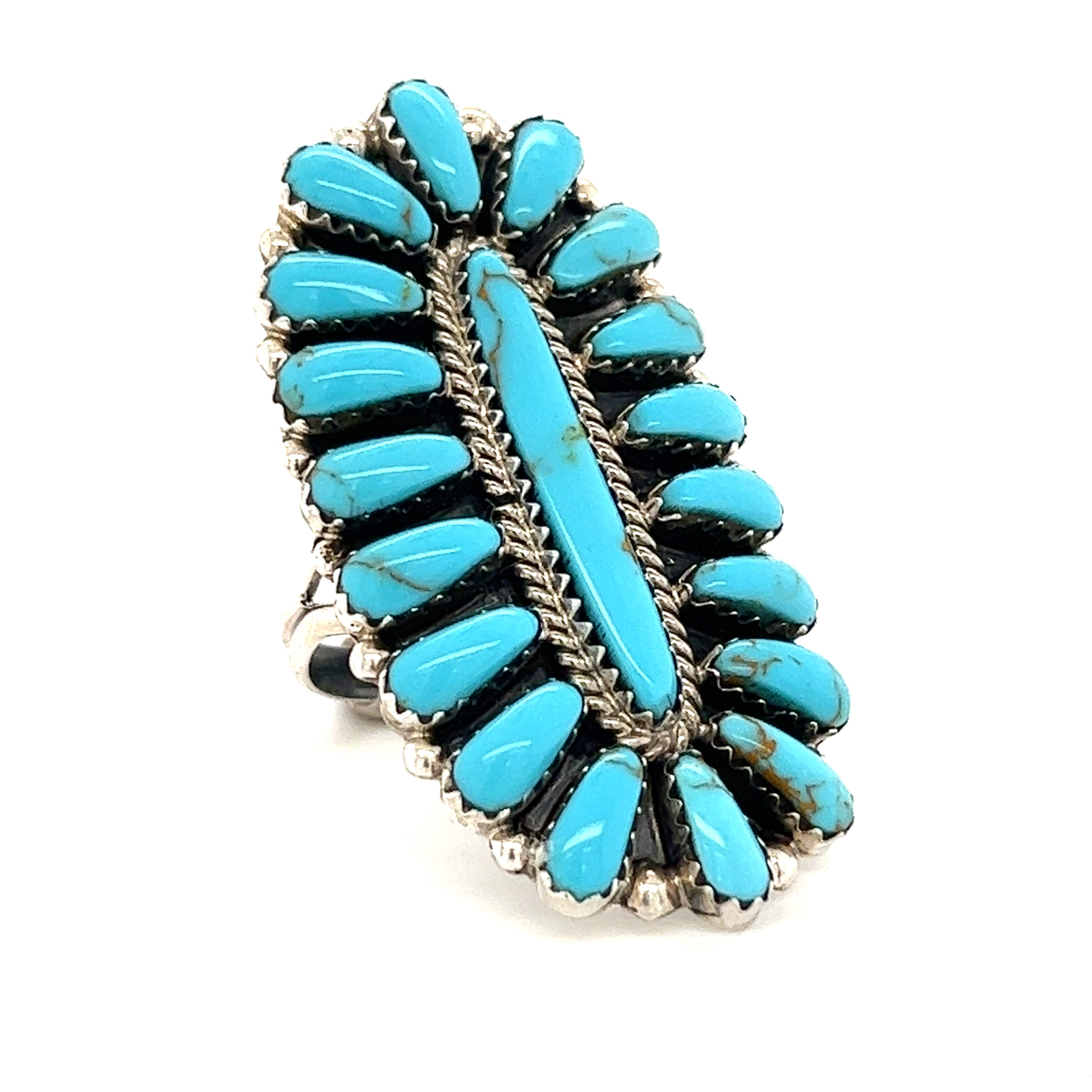 A native-inspired Gorgeous Fantail Native American Ring turquoise and sterling silver brooch.