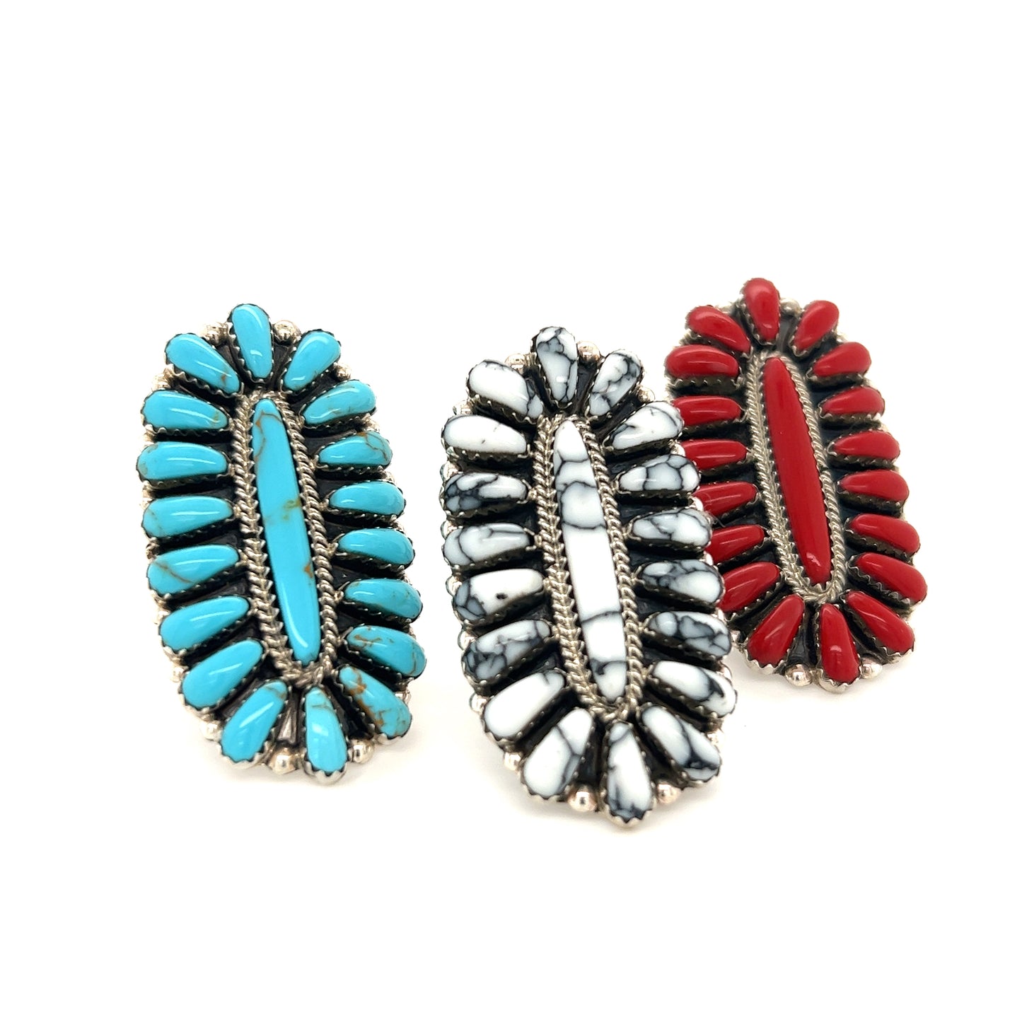 
                  
                    Three Gorgeous Fantail Native American Rings with red, blue and white stones.
                  
                