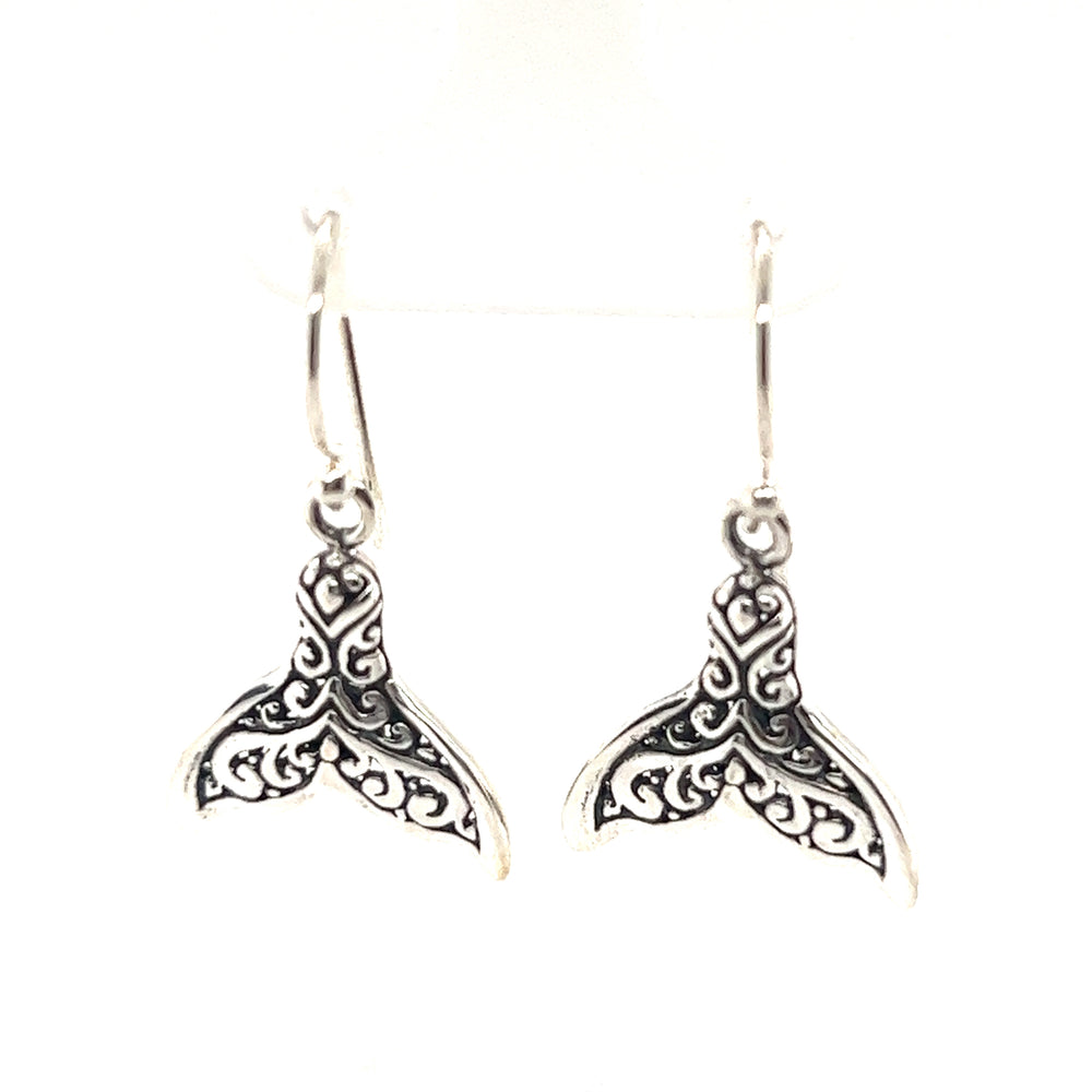 
                  
                    A pair of Super Silver's Enchanting Filigree Whale Tail Earrings.
                  
                