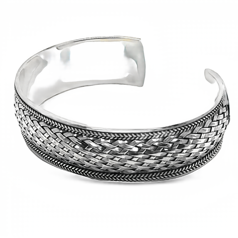 An oxidized Super Silver Bali cuff bracelet with a statement basket weave design, displayed on a white background.