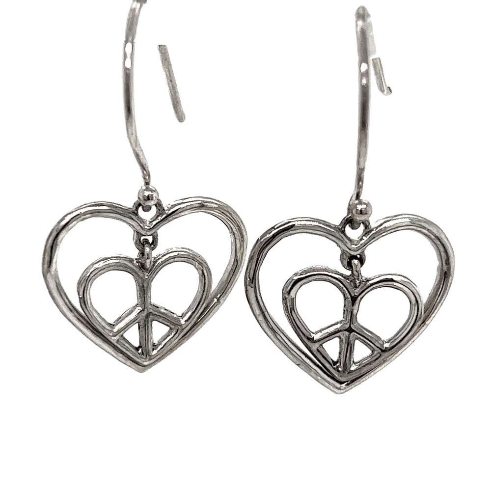 
                  
                    Super Silver's Hearts With Peace Signs Earrings are made of .925 Silver and feature a peace sign design.
                  
                