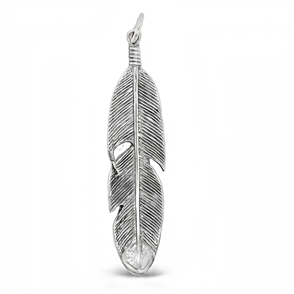 
                  
                    A rustic Super Silver Medium Size Feather Pendant on a white background.
                  
                