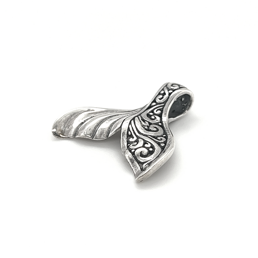 An Elegant Half Filigree Whale Tail Pendant by Super Silver on a white background.
