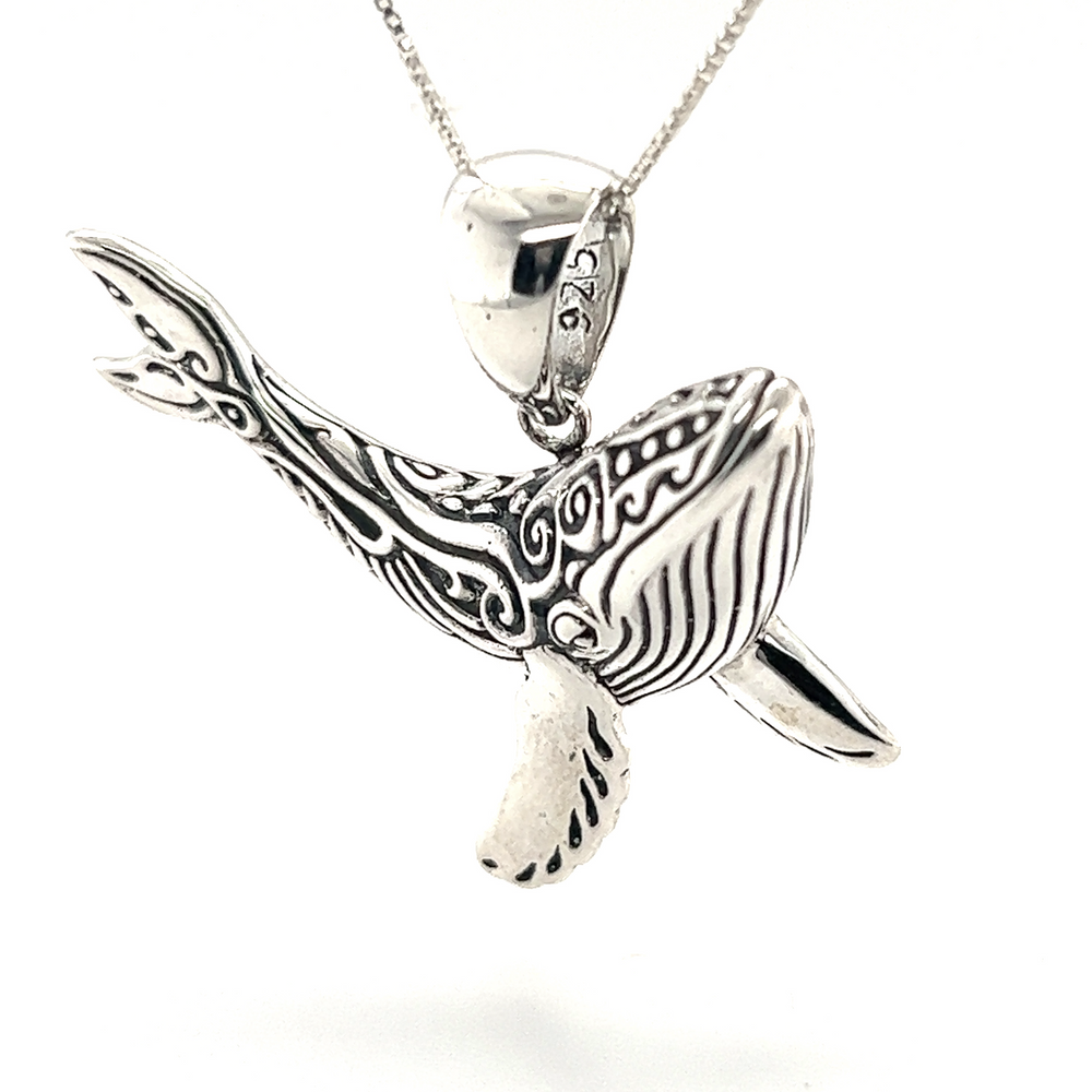 An ocean-themed Super Silver pendant featuring a Stunning Whale Pendant.