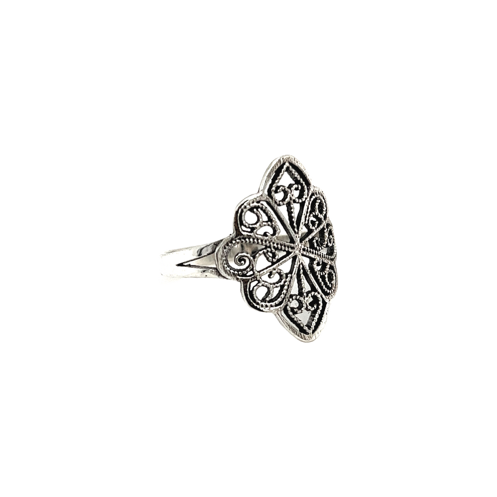 
                  
                    A Super Silver vintage style Silver Filigree Shield Ring with a delicate filigree design.
                  
                