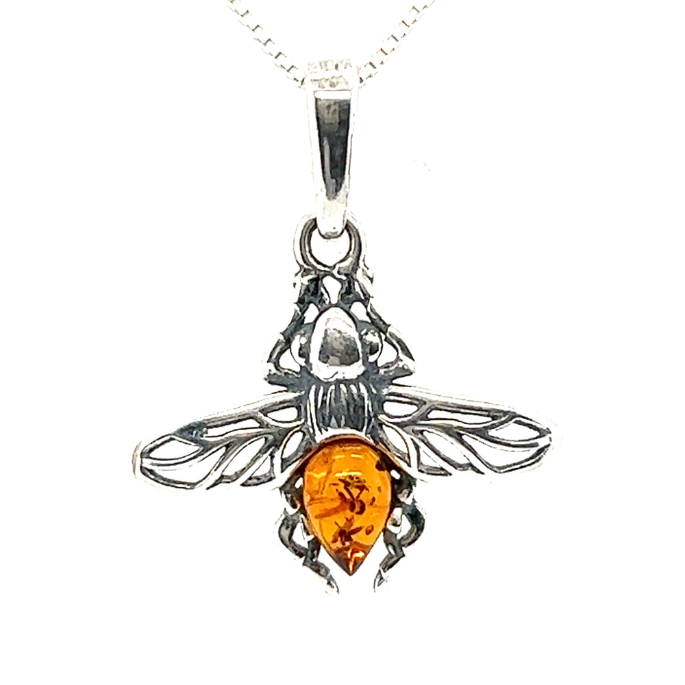 A Delicate Amber Bee Pendant by Super Silver with a beautiful amber stone.