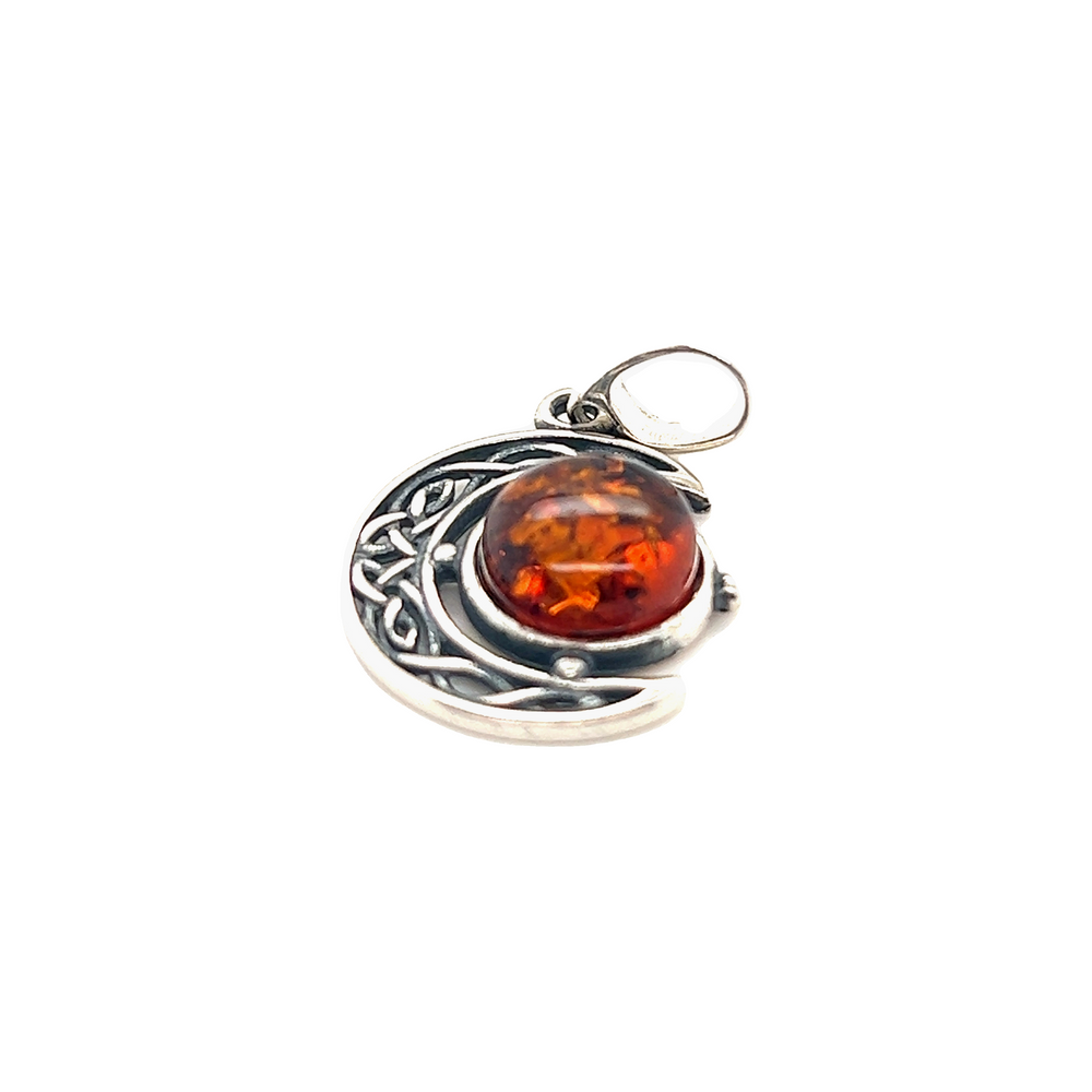 
                  
                    This Super Silver Celtic Amber Crescent Moon Pendant features a captivating Baltic amber stone, complemented by exquisite Celtic art.
                  
                