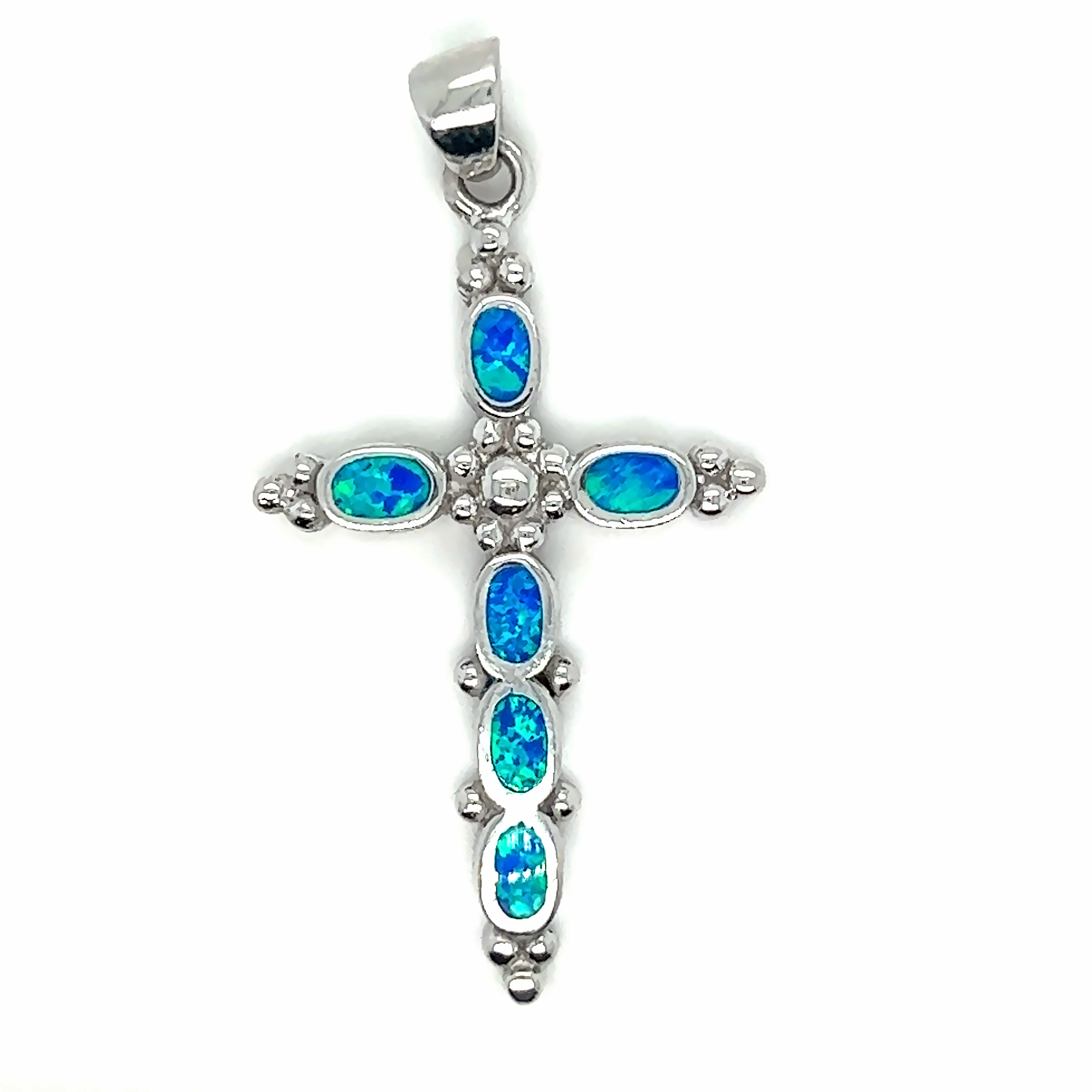 A Super Silver Blue Opal Cross Pendant With Oval Stones adorned with dazzling blue opal stones.