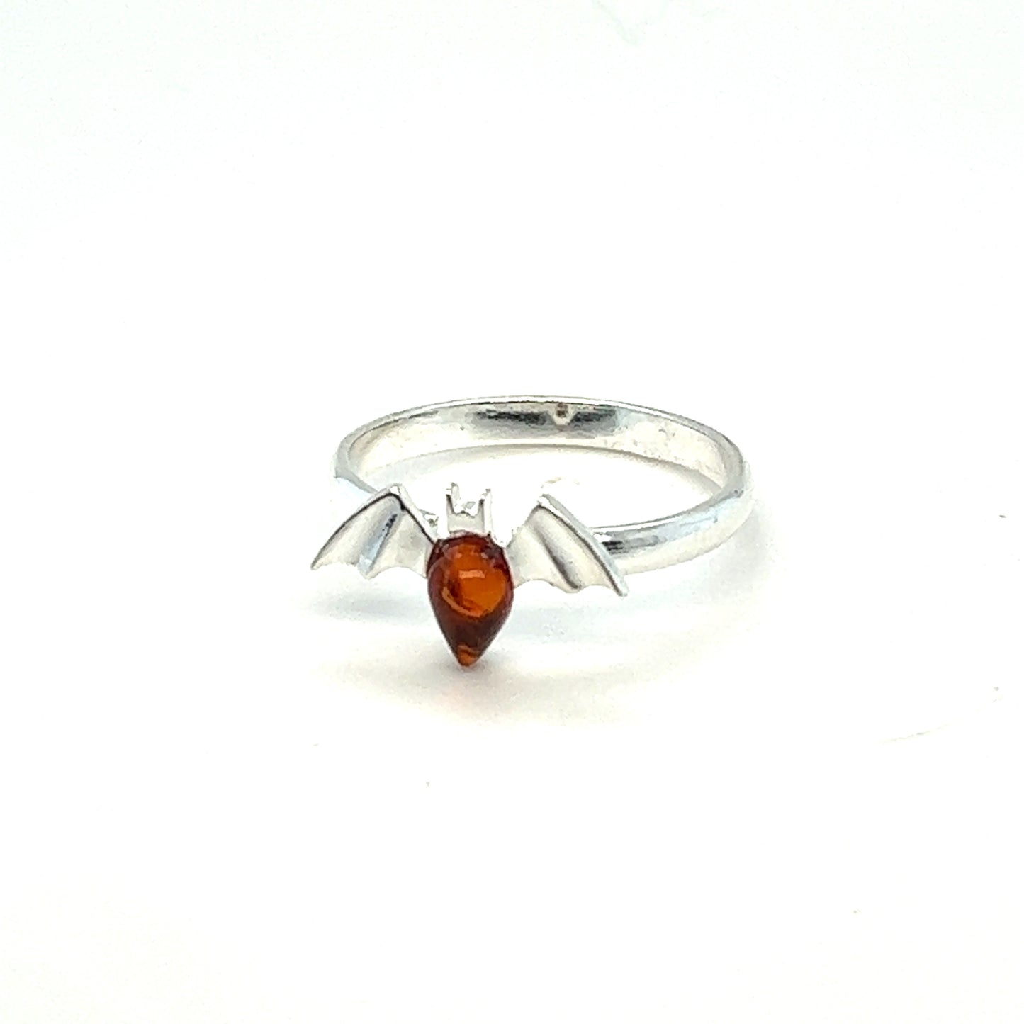 
                  
                    A shiny silver Baltic Amber Bat Ring adorned with a meticulously crafted bat design, perfect for lovers of Gothic jewelry or those seeking a unique accessory to showcase their fascination with bats. (by Super Silver)
                  
                