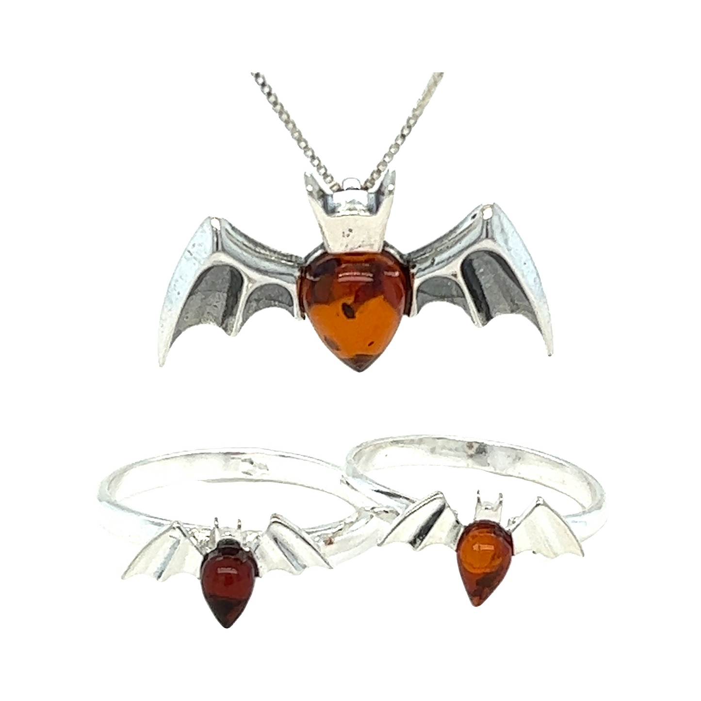A bewitching collection of Baltic Amber Bat Ring, necklace and earrings adorned with Baltic amber, perfect for witches or anyone seeking unique jewelry pieces.