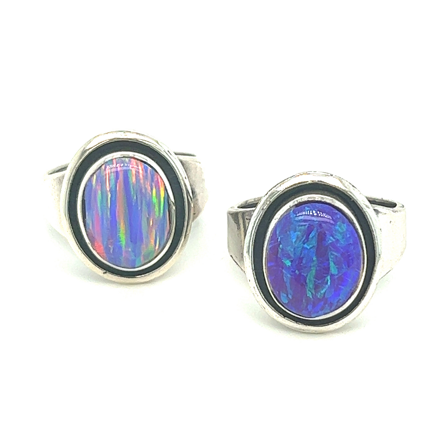 Two Radiant Opal Signet Rings with opal and blue opal stones.