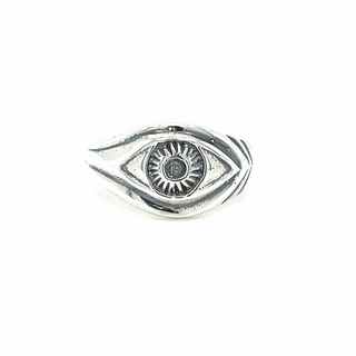 An Evil Eye Ring adorned with an evil eye design.