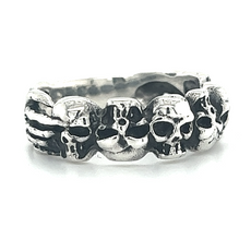 
                  
                    A gothic Alternating Skull Ring with Adjacent Skeleton Hands adorned with four skulls.
                  
                