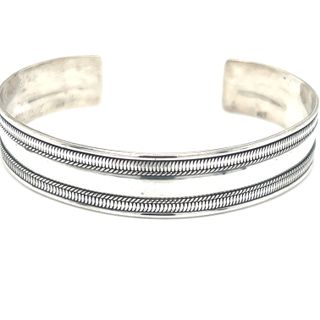 
                  
                    An adjustable size Super Silver Cuff Bracelet with a striped pattern, perfect for everyday wear.
                  
                