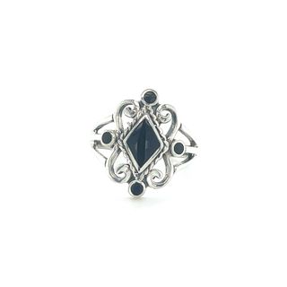 
                  
                    A Victorian-style sterling silver inlay ring with a black stone.
                  
                