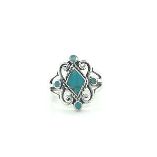 
                  
                    A Victorian Style Inlay Ring with blue stone inlay.
                  
                