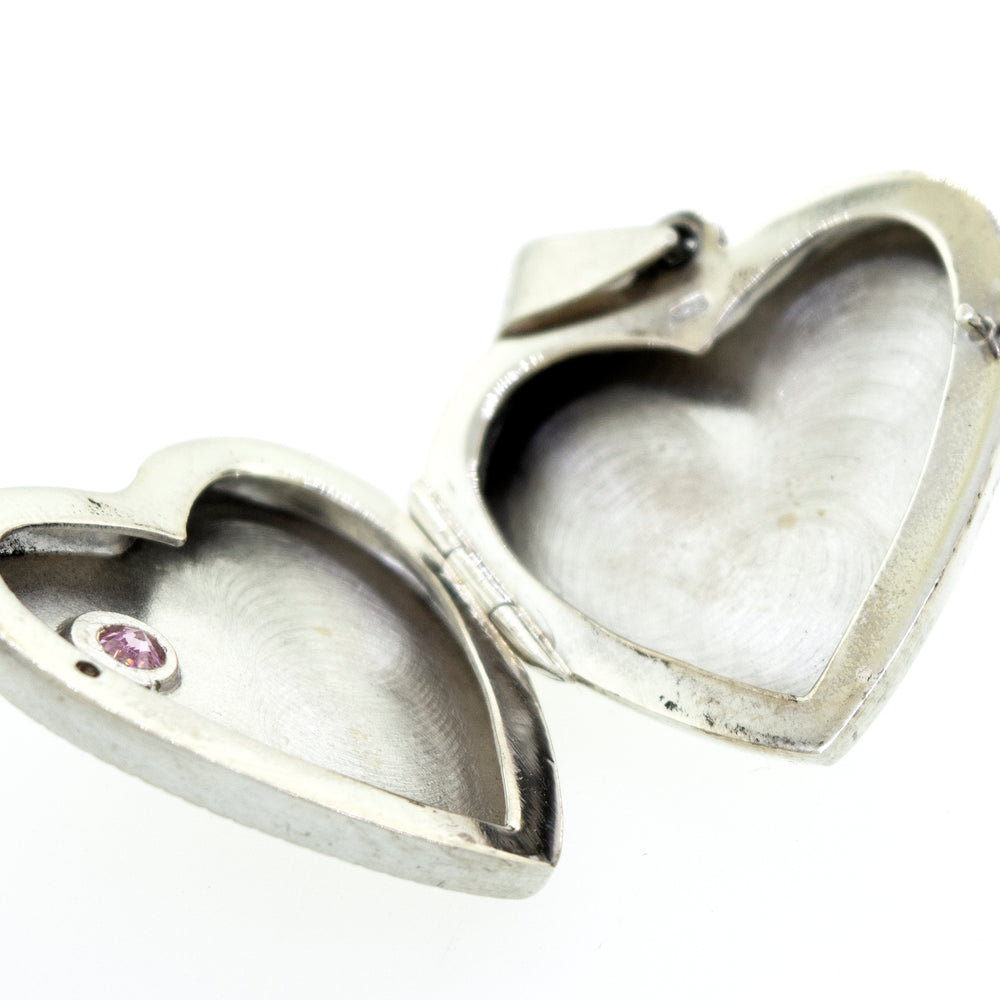 
                  
                    A Super Silver heart-shaped locket with a romantic charm.
                  
                