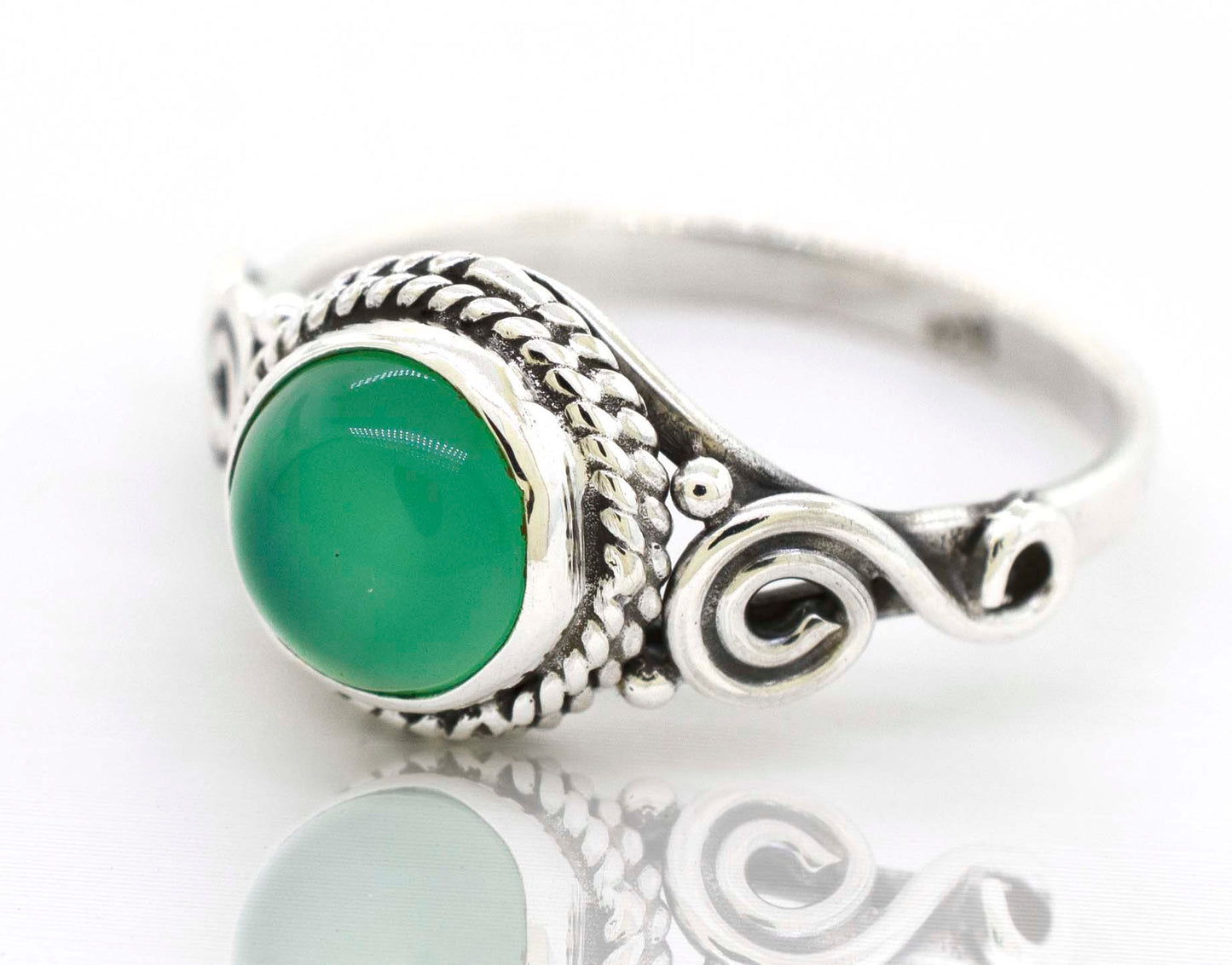 
                  
                    A Super Silver Gemstone Circle Ring With Rope Border And Swirl Design, exuding a bohemian vibe.
                  
                