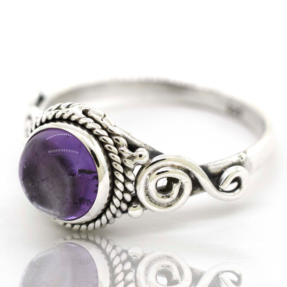 
                  
                    Super Silver's Gemstone Circle Ring With Rope Border And Swirl Design in .925 sterling silver.
                  
                