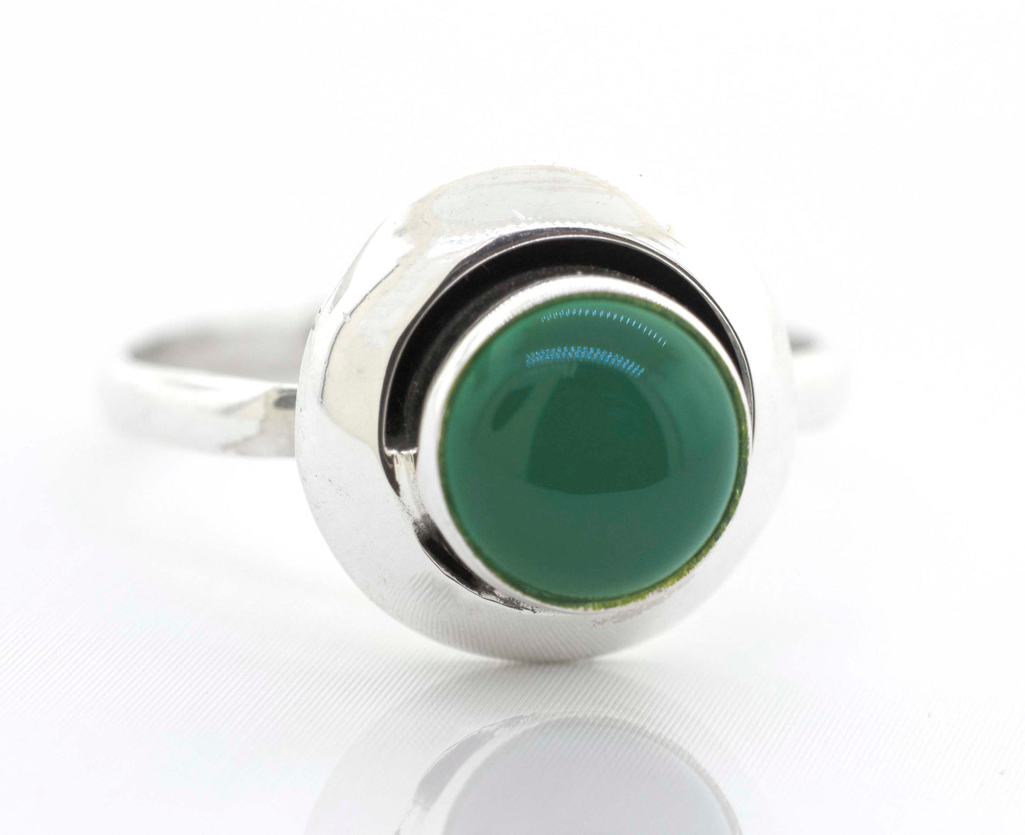 
                  
                    A contemporary Round Gemstone Ring With Oxidized Outline, crafted from sterling silver and featuring a striking green stone, by Super Silver.
                  
                
