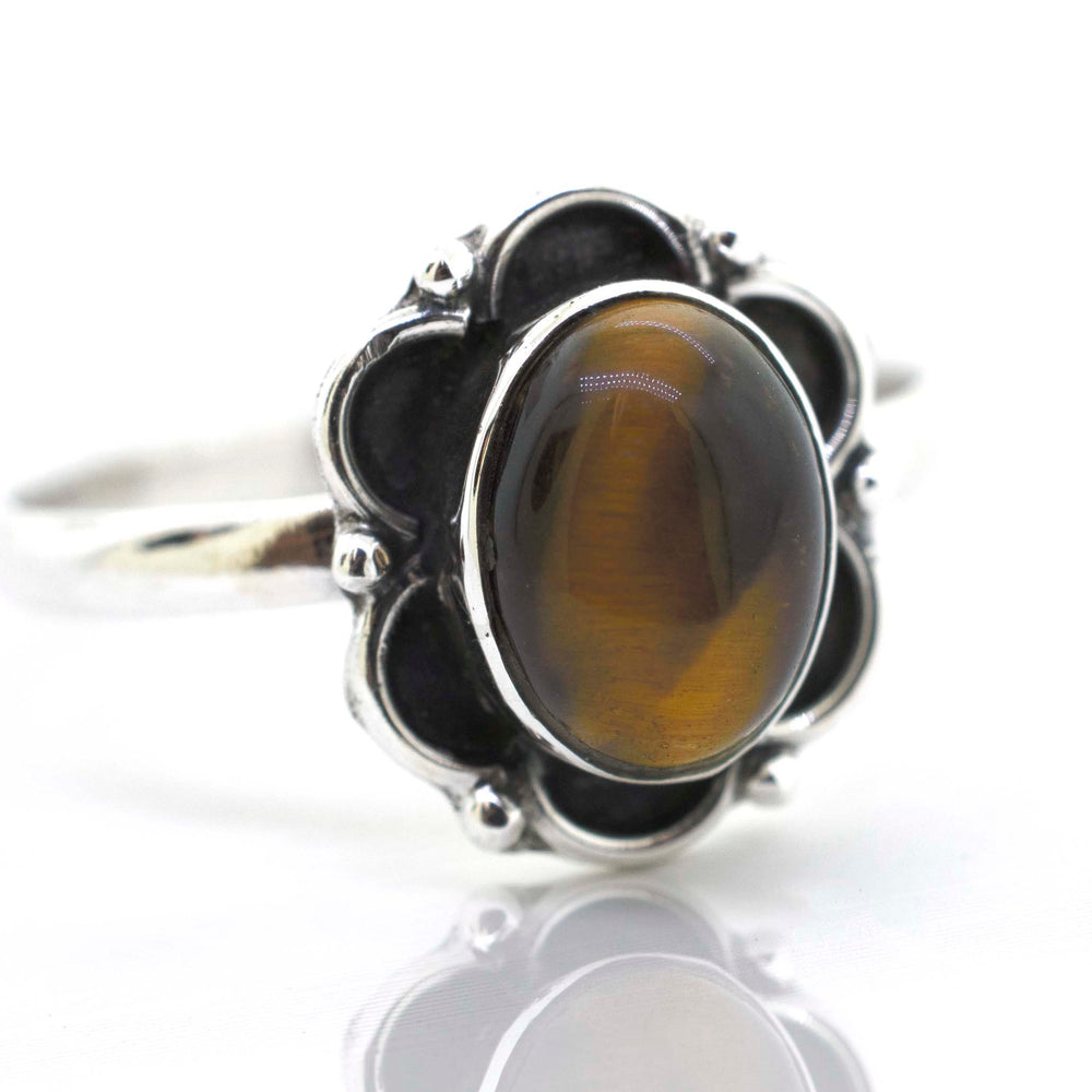 
                  
                    A Super Silver Gemstone Ring With Oxidized Flower Design on a white background.
                  
                