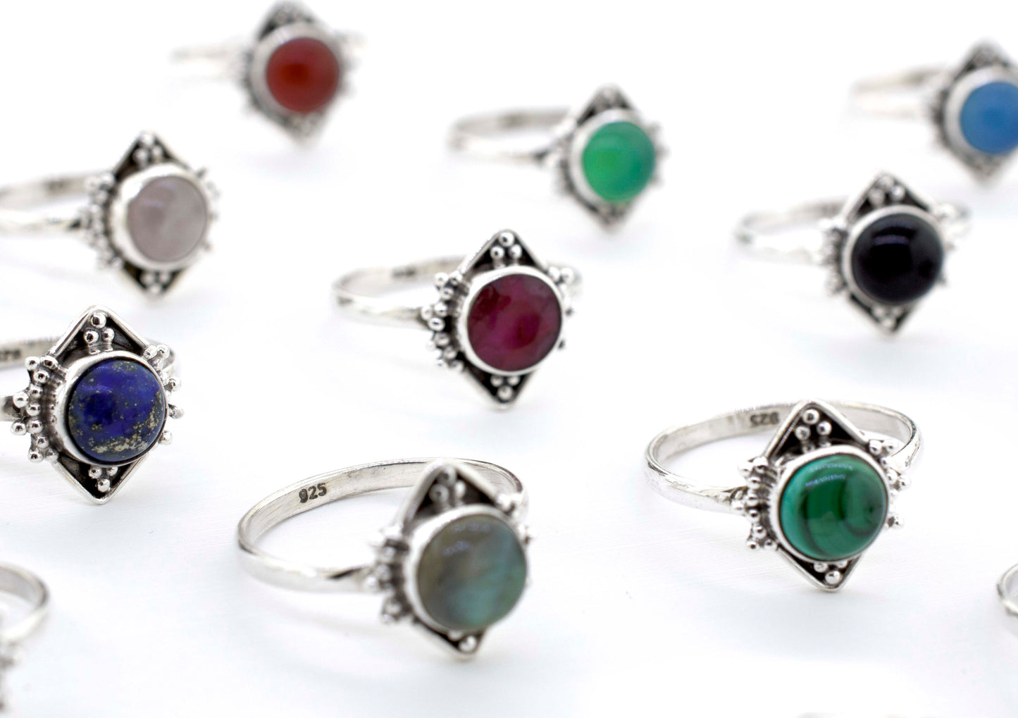 A group of Round Gemstone Rings With Oxidized Diamond Shape Pattern on a white background.