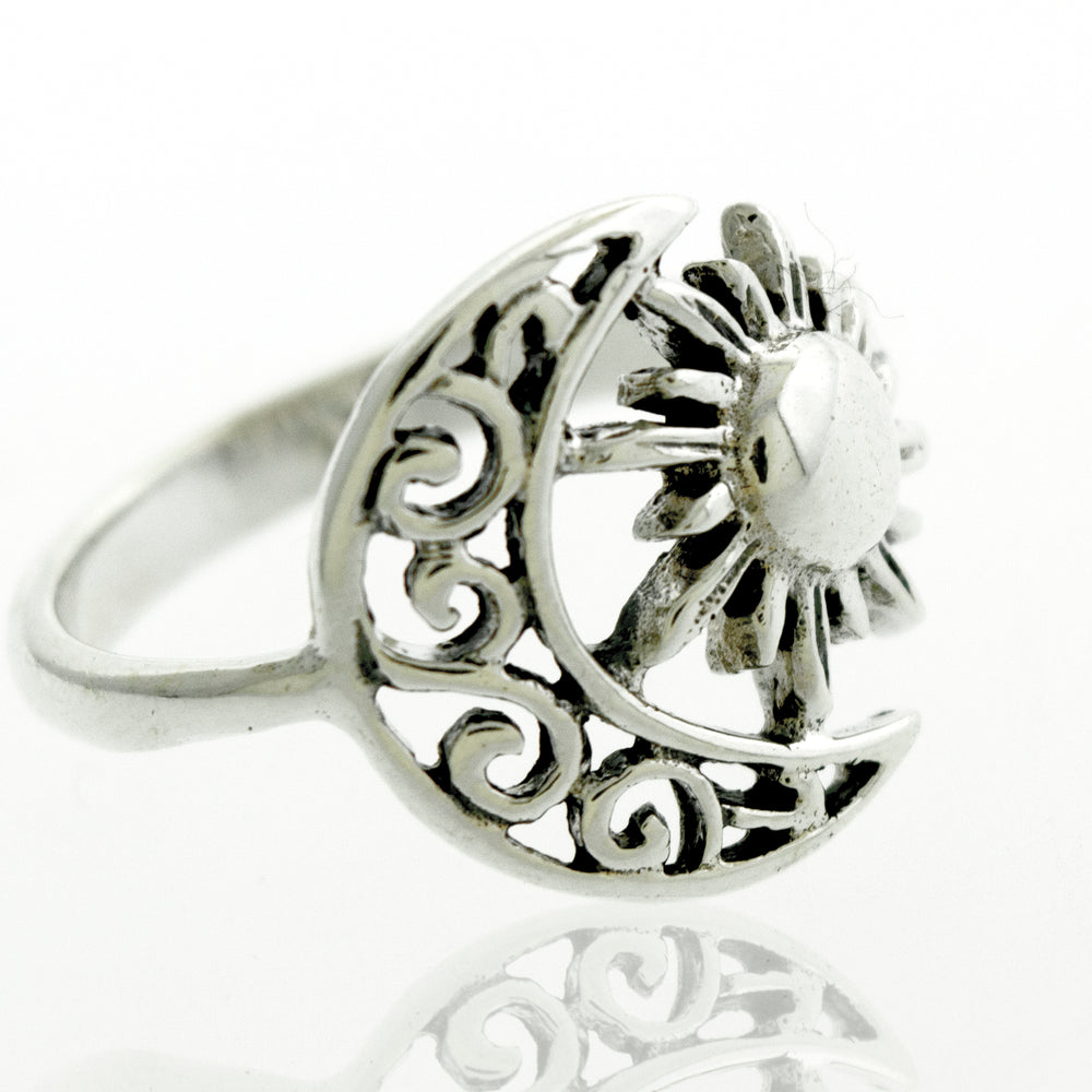 
                  
                    A Moon And Sun Ring With Swirl Design adorned with a celestial moon and sun design.
                  
                