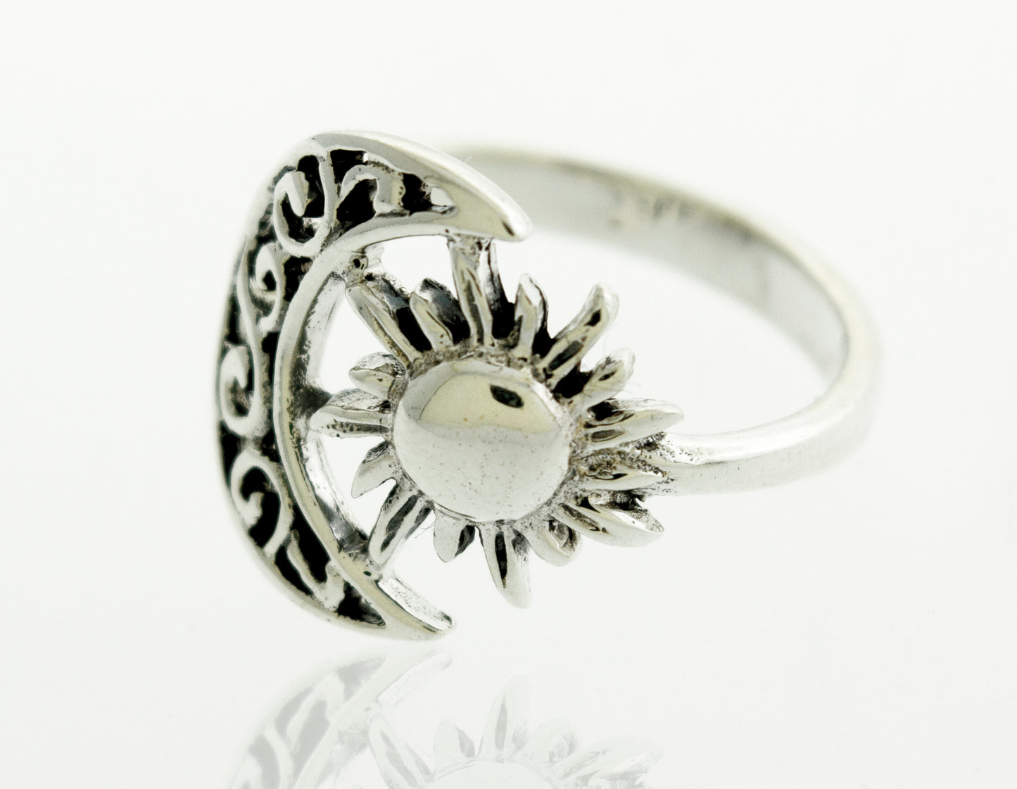 
                  
                    A boho silver Moon And Sun Ring With Swirl Design.
                  
                