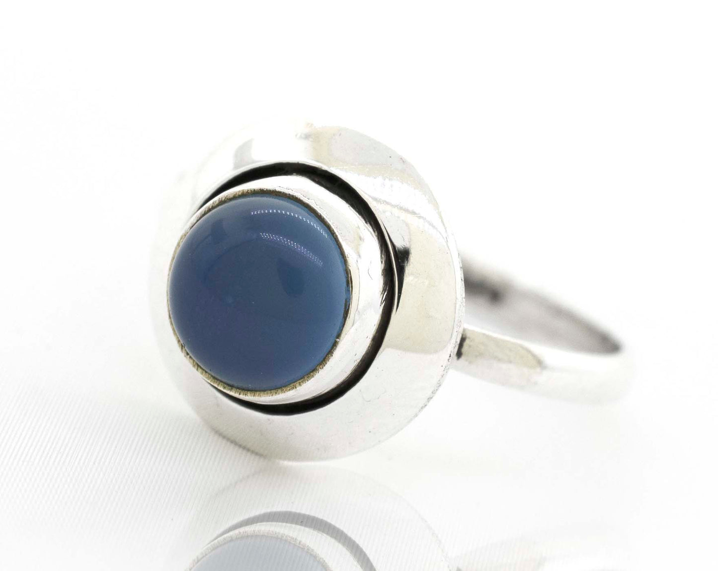 
                  
                    A boho-inspired Round Gemstone Ring With Oxidized Outline adorned with a stunning blue stone.
                  
                