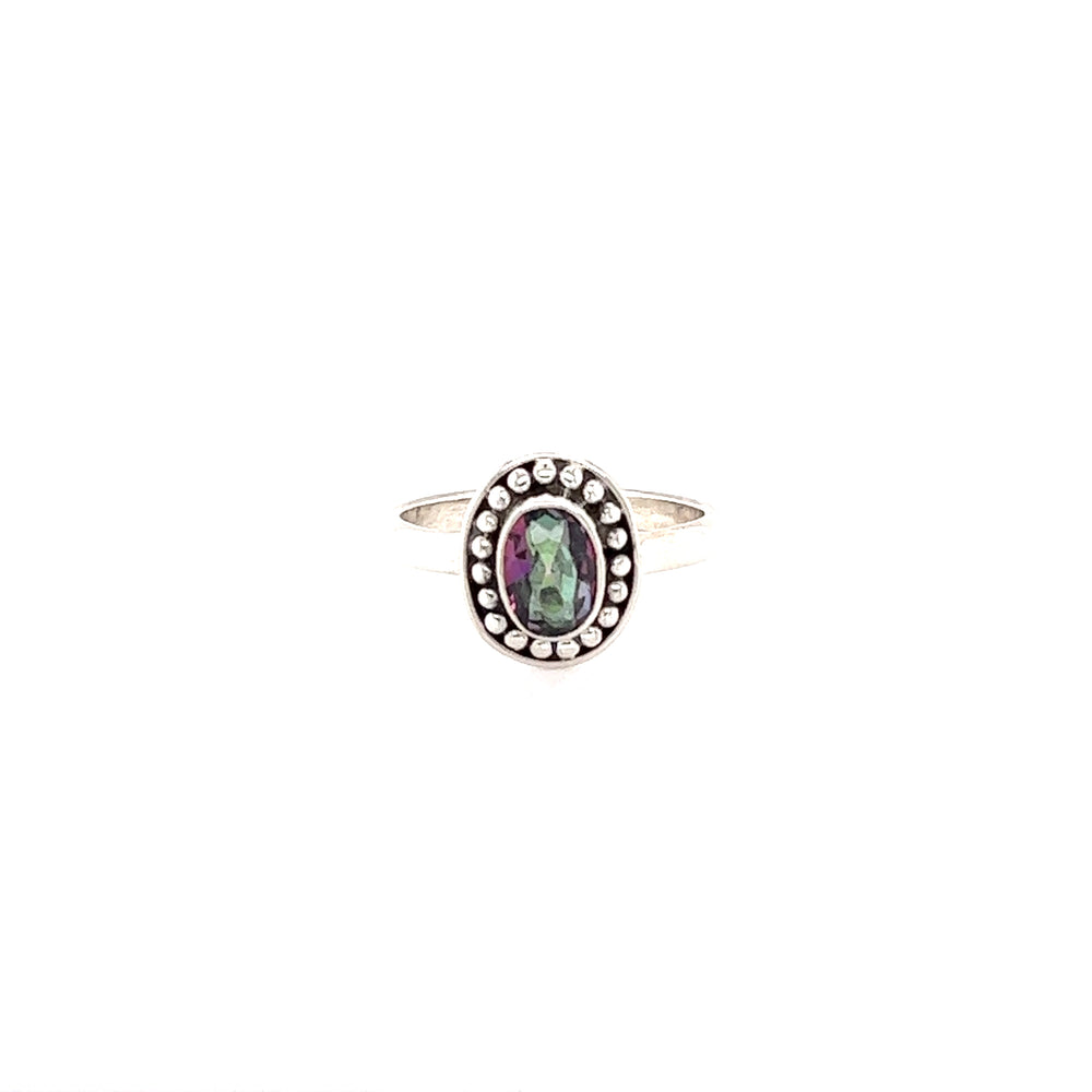 
                  
                    A Oval Gemstone Ring with Ball Disk Border with a black stone and diamonds.
                  
                