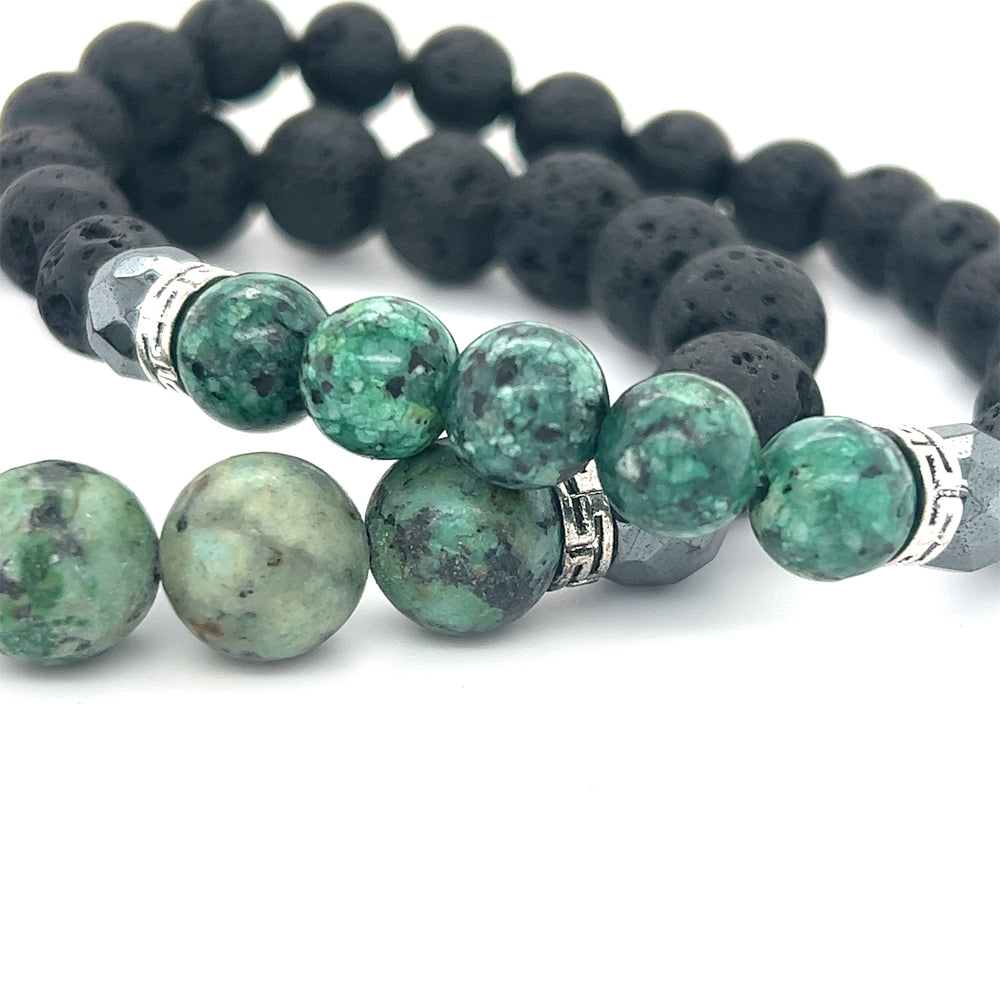 
                  
                    Two Essential Oil Bracelets with Turquoise And Lava Rock Stones by Super Silver.
                  
                