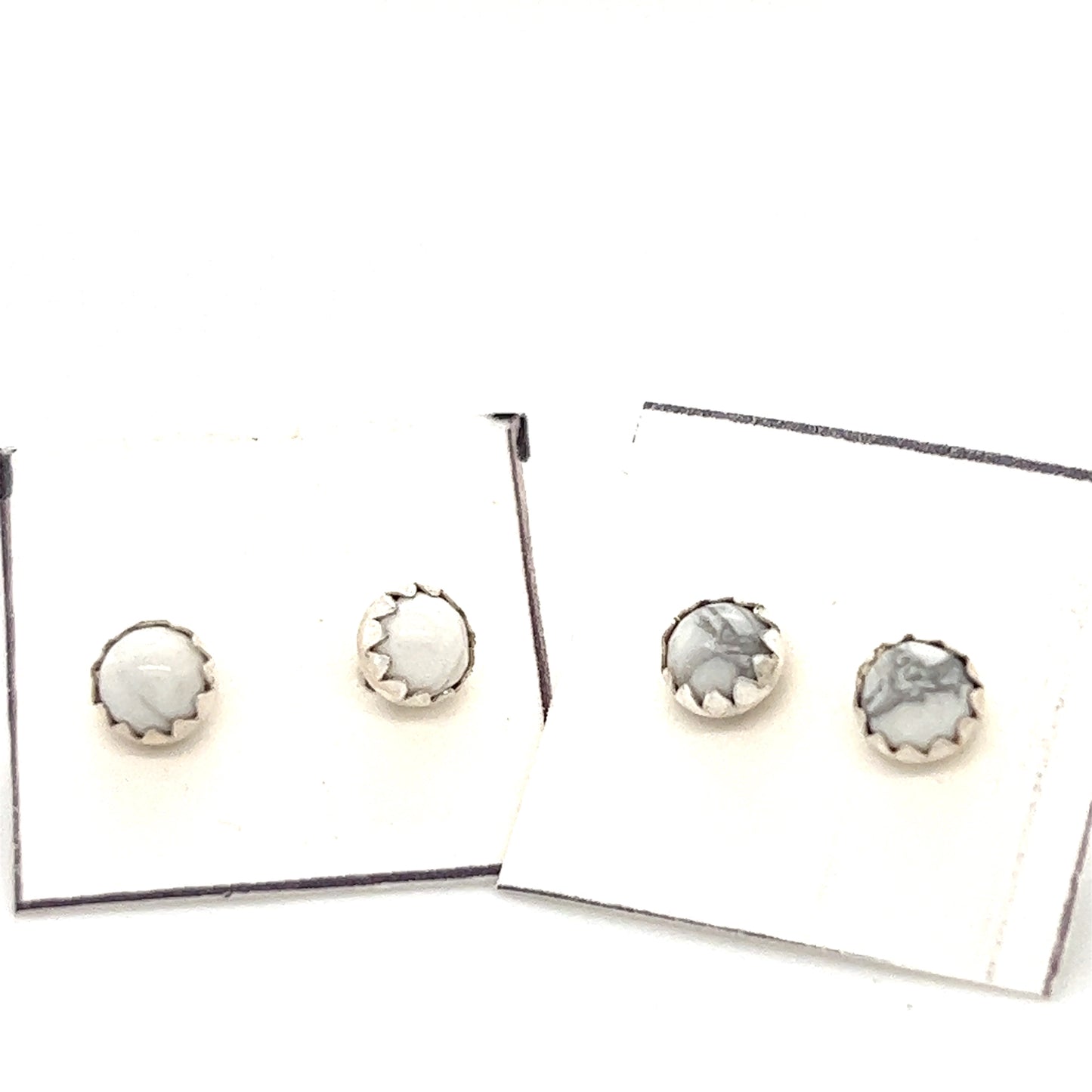 Super Silver's Handcrafted White Buffalo Studs are delicately crafted in Native American style on a white background.