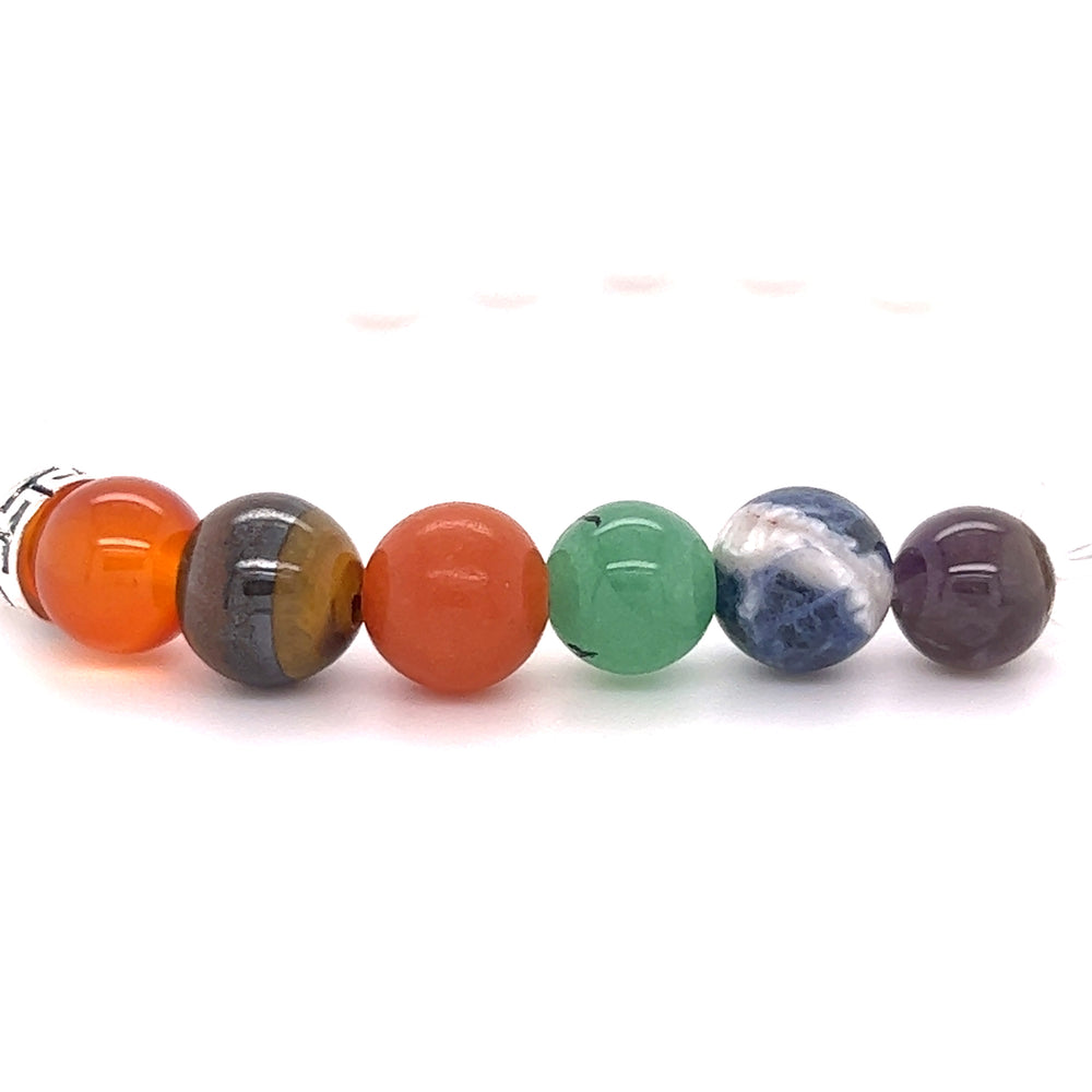 A row of different colored stones on a Super Silver background, perfect for everyday wear.