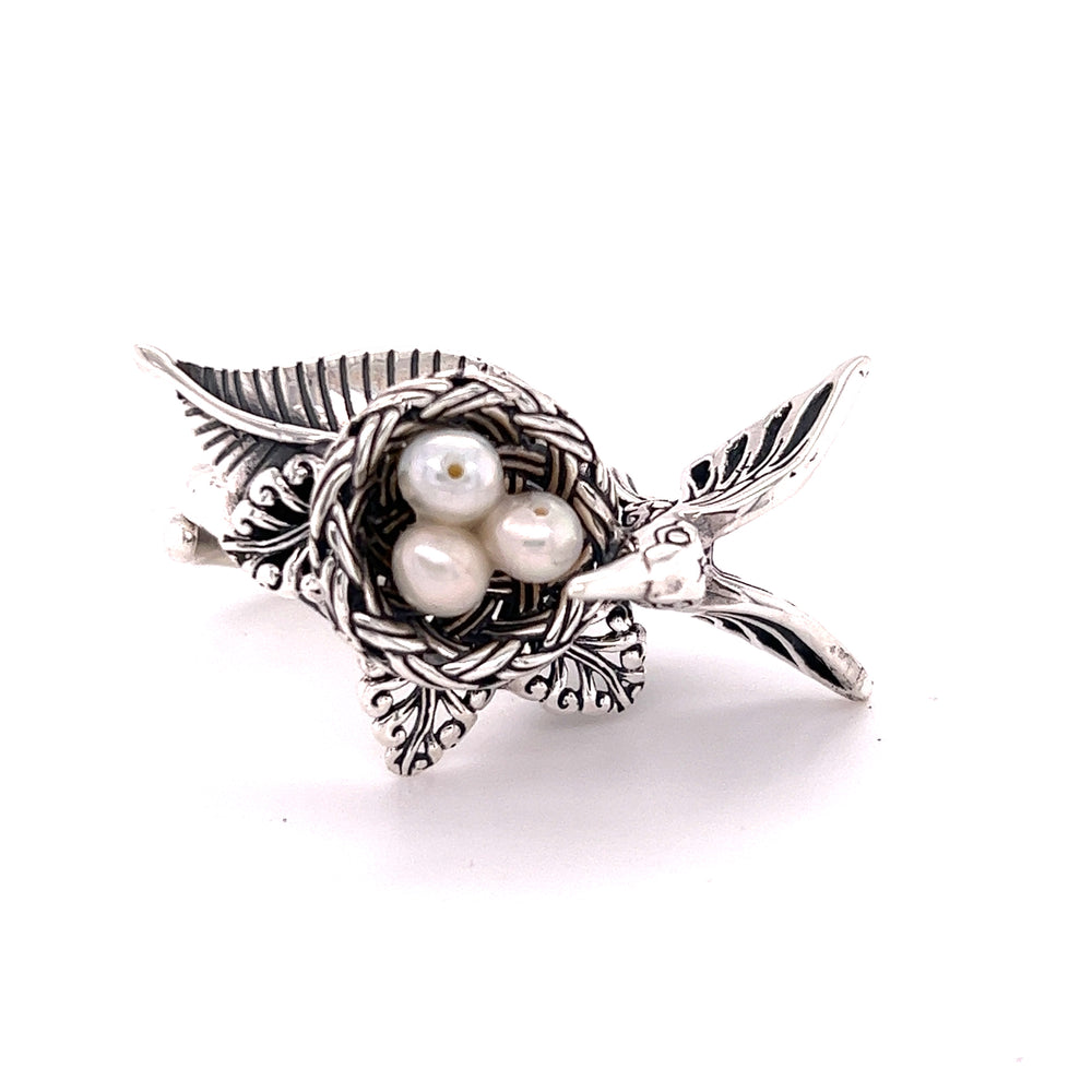 An exquisite Hummingbird With Nest of Pearls ring from Super Silver.