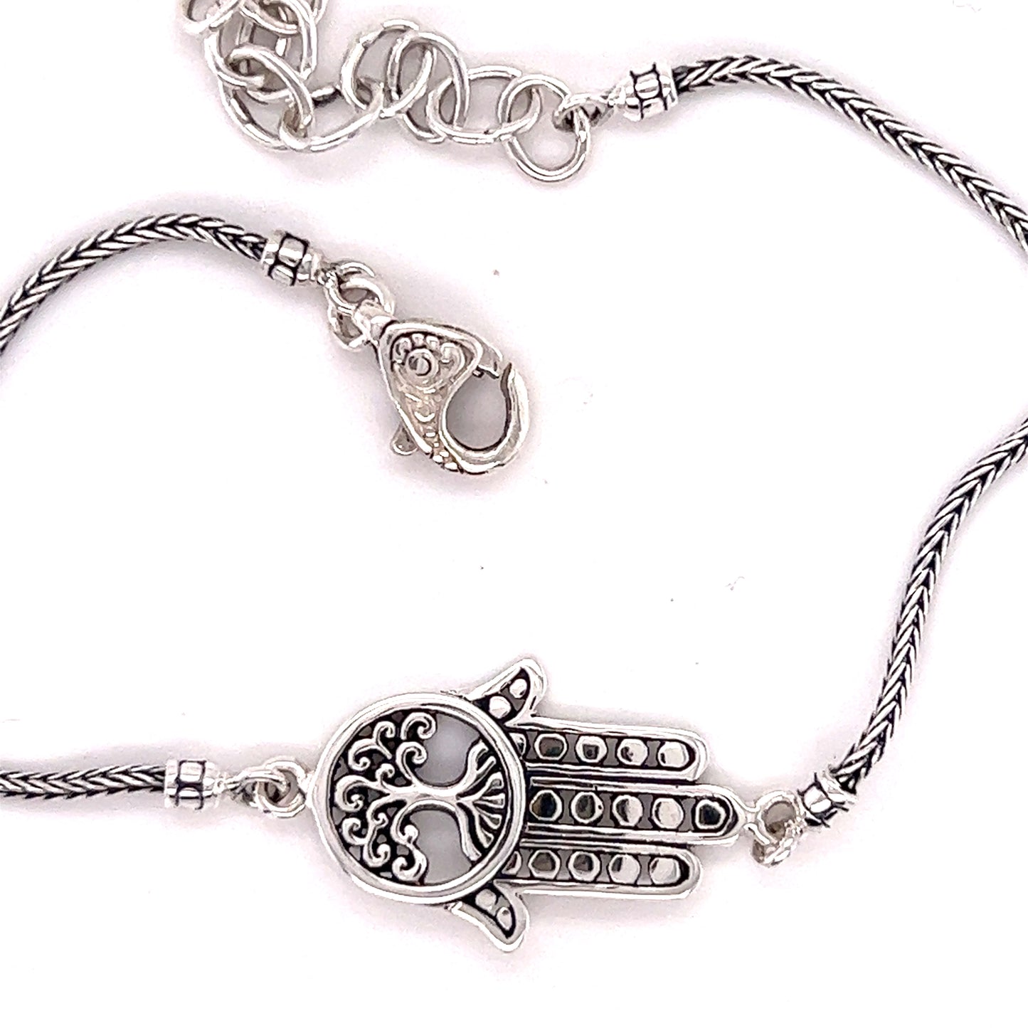 An everyday wear Hamsa with Tree of Life Bracelet from Super Silver, showcased on a clean white background.