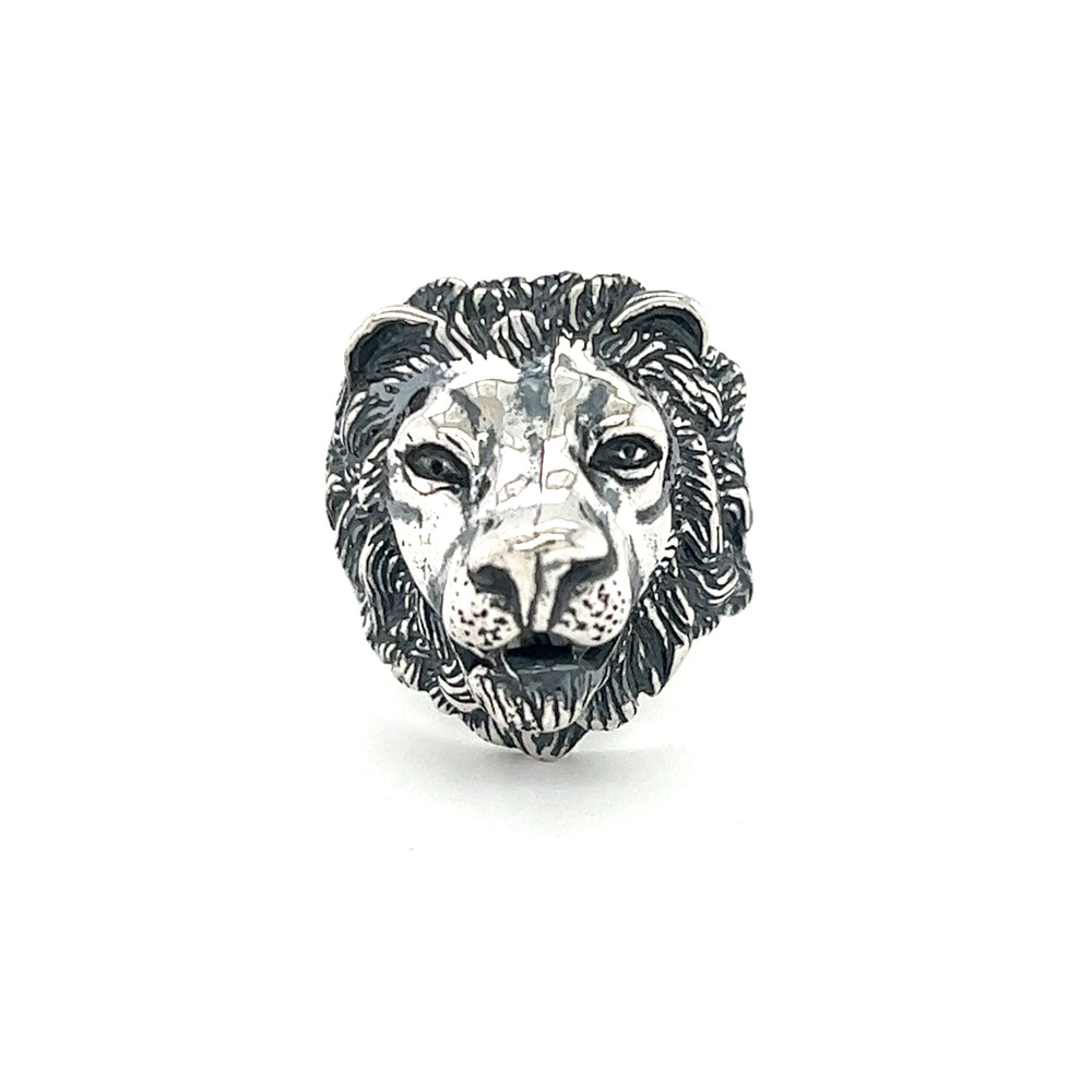 A sterling silver Lion Head Ring with a lion head design.