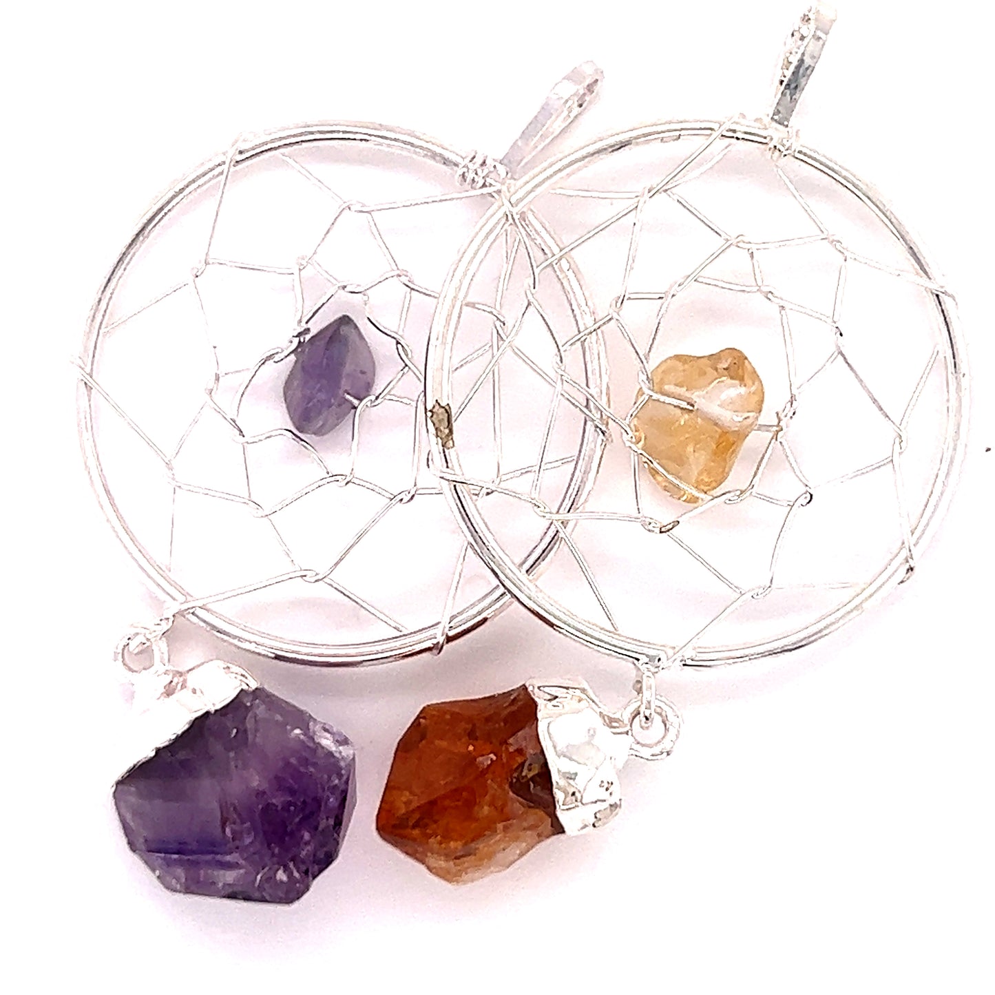 
                  
                    Super Silver Dreamcatcher Pendant with Gemstone Point adorned with amethyst and citrine gemstones, featuring a raw crystal droplet.
                  
                