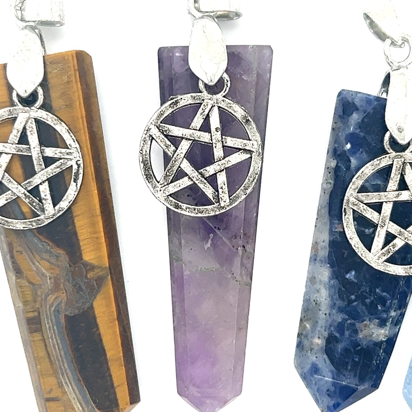 
                  
                    Three Super Silver Pentagram Stone Slab Pendants featuring a variety of stones.
                  
                