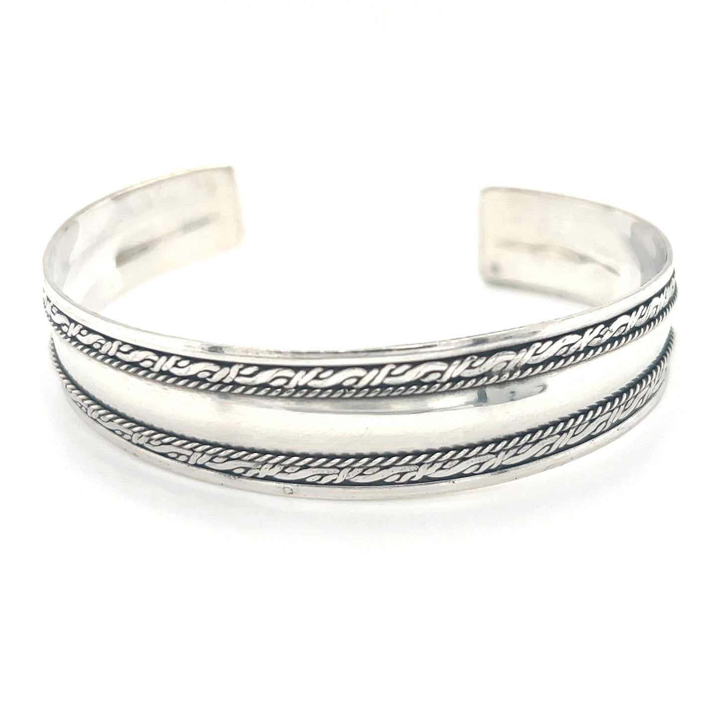 
                  
                    A Super Silver handmade Silver Domed Cuff with Rope Pattern, perfect for stacking or adding a touch of Bali-inspired style to your look.
                  
                