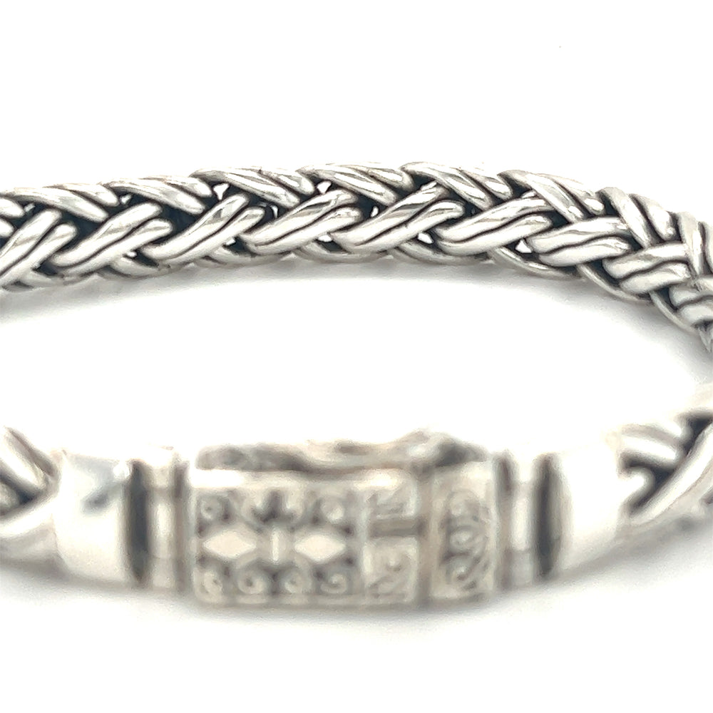 
                  
                    A Super Silver Heavy Double Strand Braided Bracelet with a clasp, perfect as a conversation starter or statement piece.
                  
                