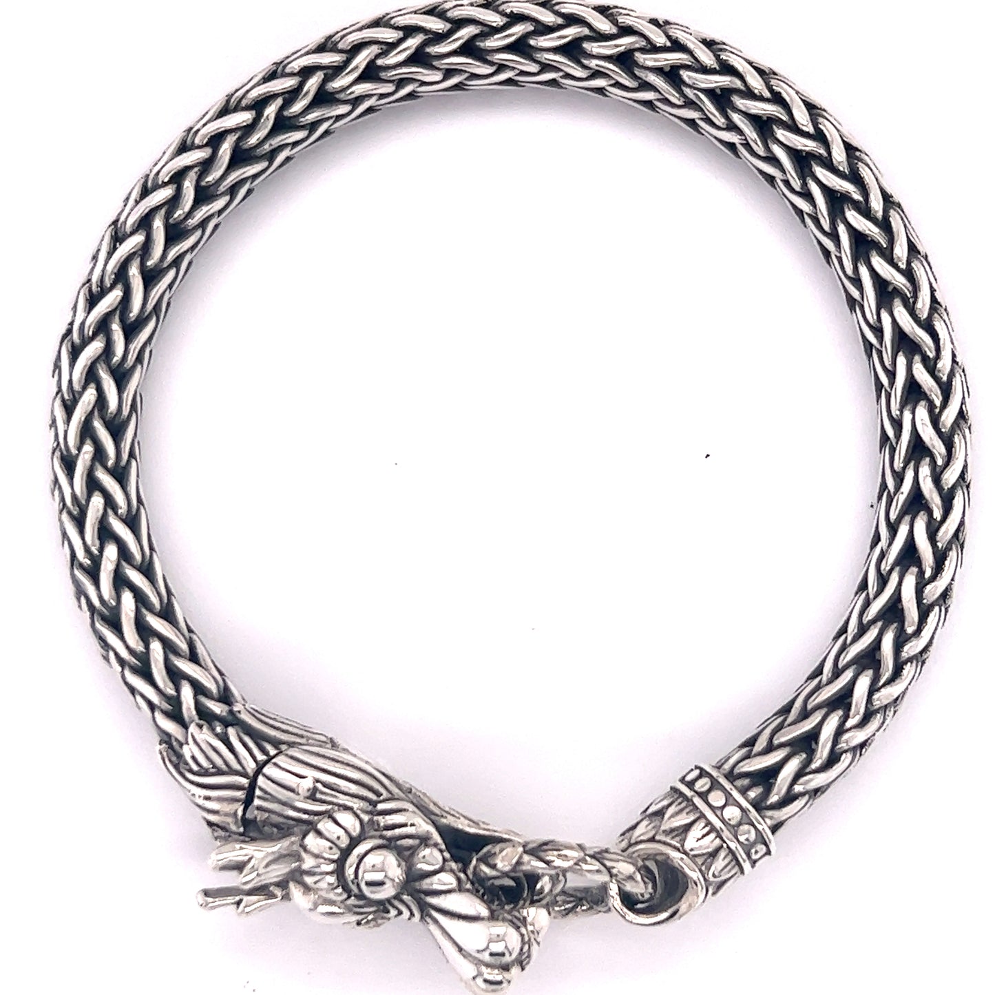 
                  
                    A heavy-duty Super Silver Sterling Silver Braided Rope Bracelet with Dragon Head clasp.
                  
                