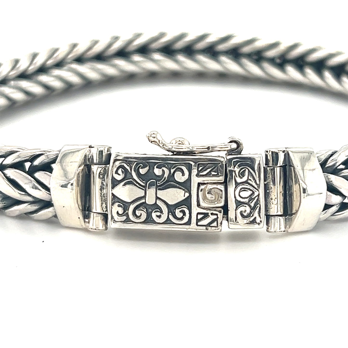 A Super Silver Heavy Braided Bracelet crafted from .925 Sterling Silver, featuring an ornate clasp.